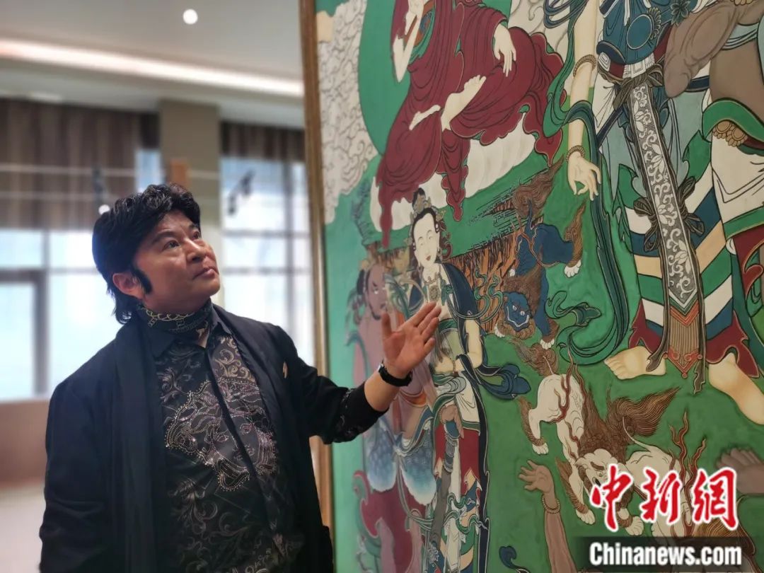 國家一級(jí)美術(shù)師劉觖。張?zhí)砀?攝